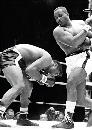 Sonny liston thumps floyd - liston,